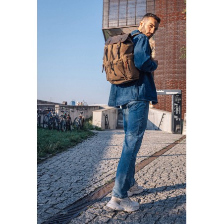 Canvas backpack with a leather flap