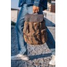 Canvas backpack with a leather flap