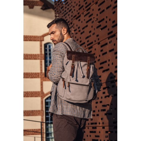 Canvas backpack with a leather flap