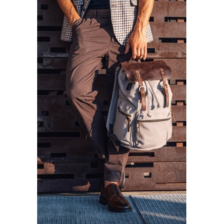 Canvas backpack with a leather flap