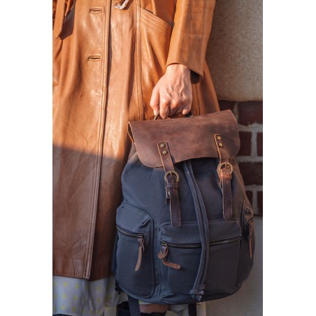 Canvas backpack with a leather flap