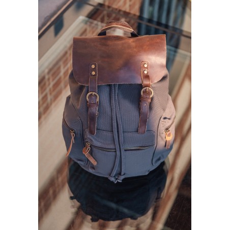 Canvas backpack with a leather flap