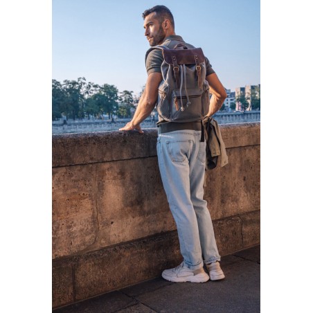 Canvas backpack with a leather flap