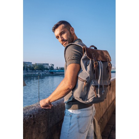 Canvas backpack with a leather flap