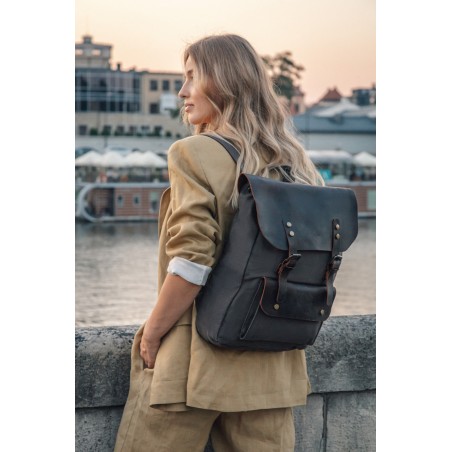 Canvas backpack with a leather flap