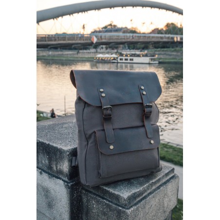 Canvas backpack with a leather flap