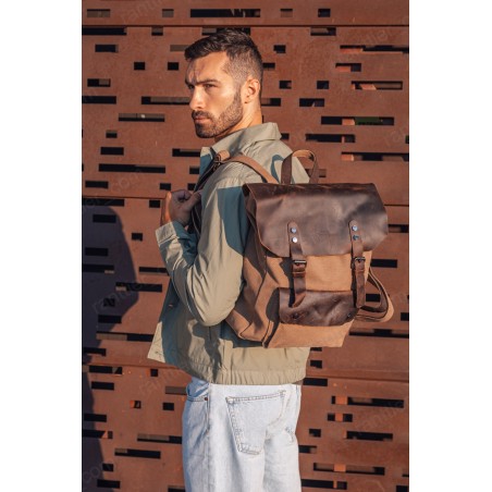 Canvas backpack with a leather flap