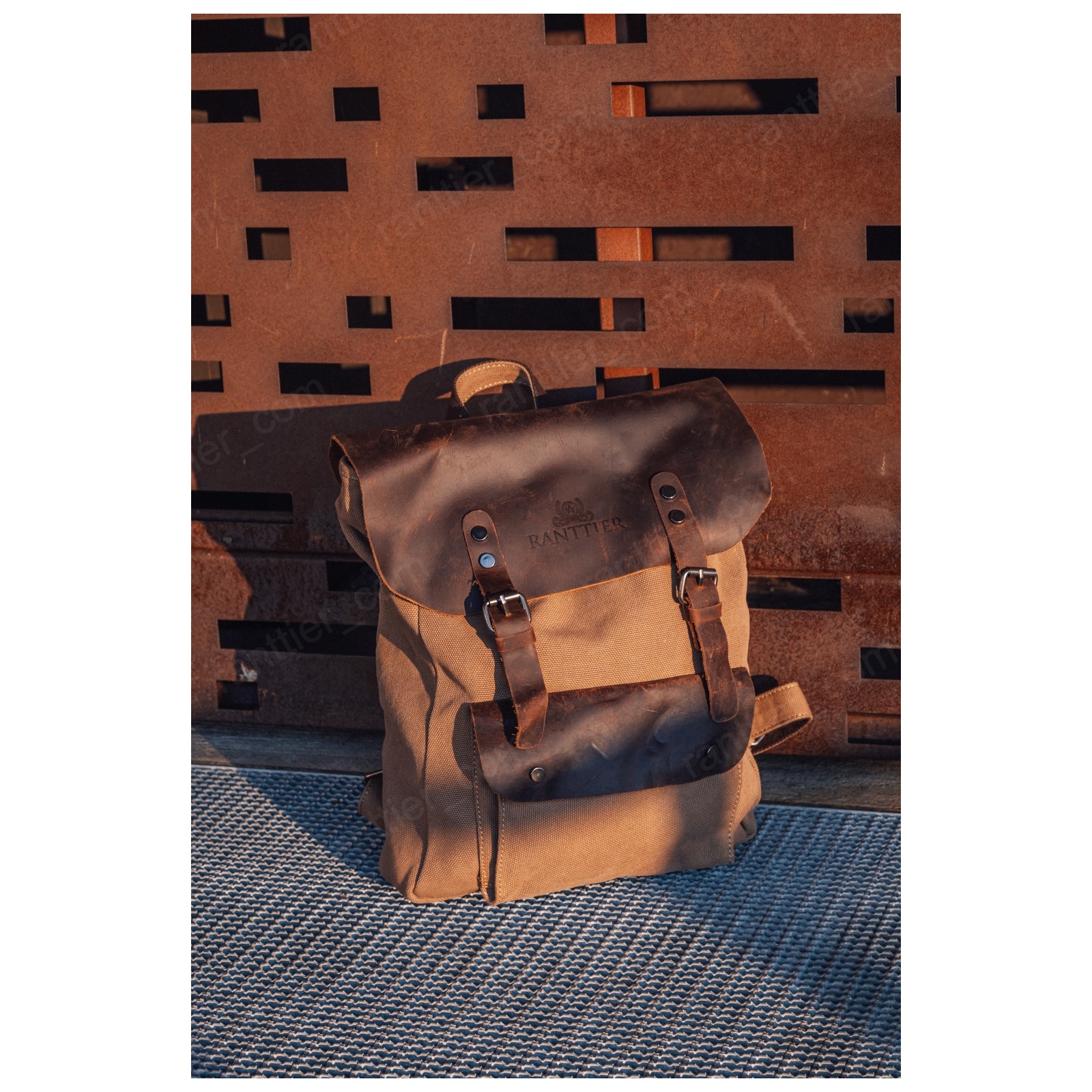 Canvas backpack with a leather flap