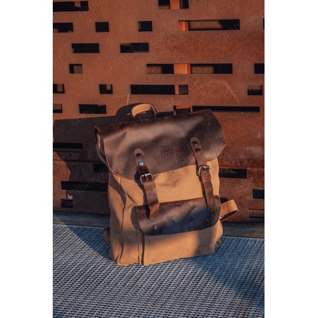 Canvas backpack with a leather flap